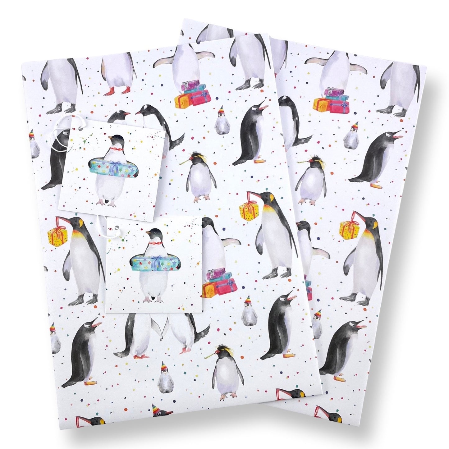 Penguin party recycled and recyclable gift wrap with matching tags by Ceinwen Campbell