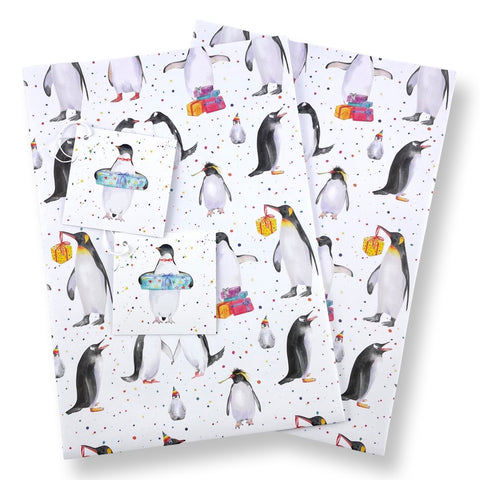Penguin party recycled and recyclable gift wrap with matching tags by Ceinwen  Campbell 