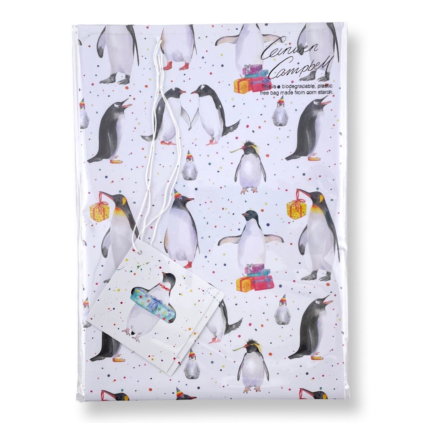Penguin party recycled and recyclable gift wrap with matching tags by Ceinwen Campbell