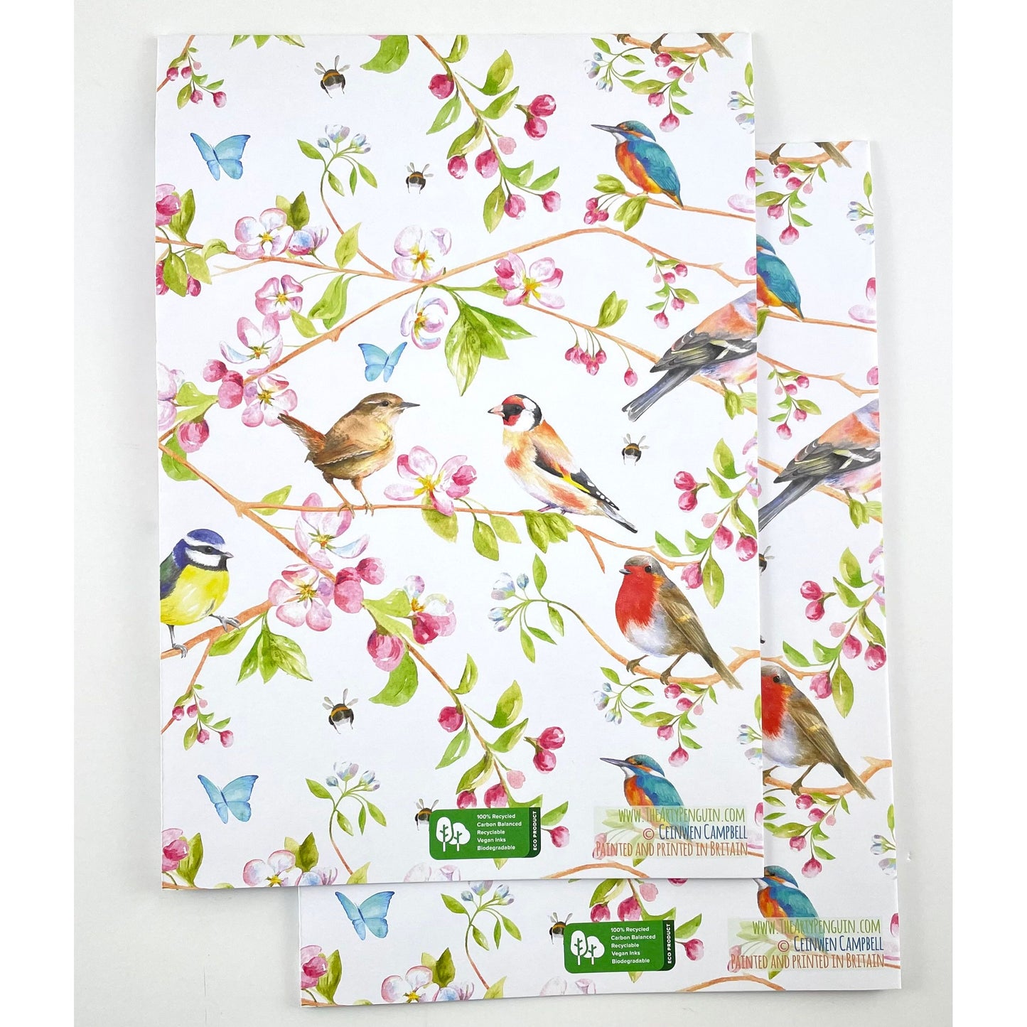 Garden birds recycled and recyclable quality gift wrapping by Ceinwen Campbell - robin, wren , blue tit, cherry blossom folded . Printed with vegetable based inks iin Britain