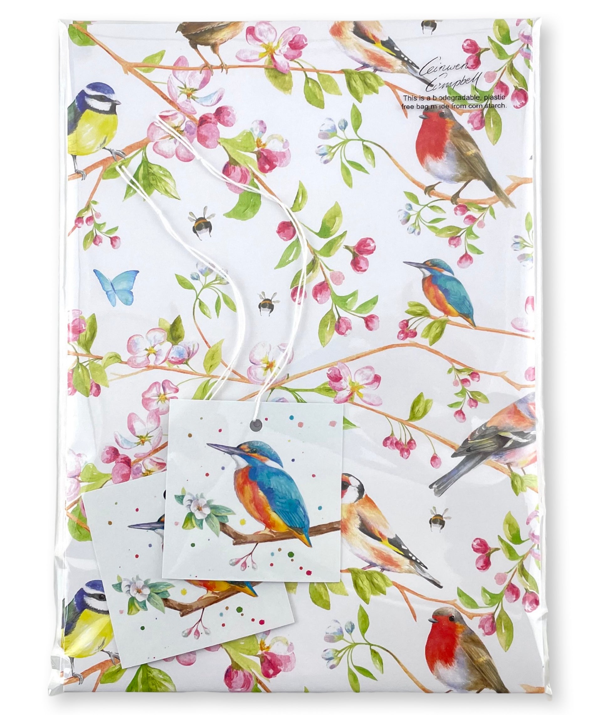 Garden birds recycled and recyclable quality gift wrapping and tags by Ceinwen Campbell - robin, wren , blue tit, cherry blossom folded for postage in cornstarch packaging