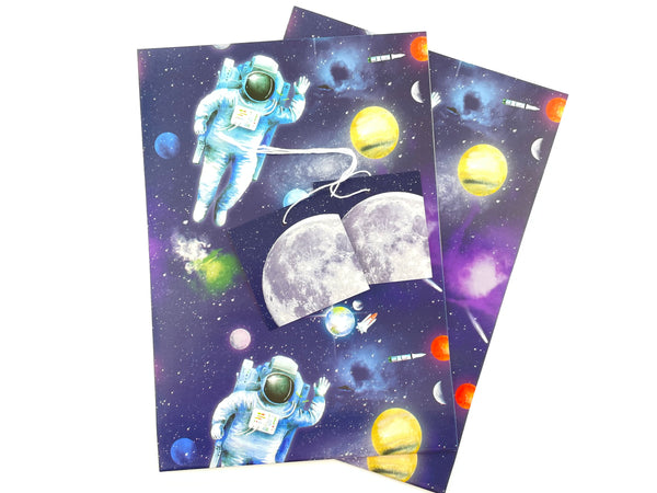 Space, planets and astronaut recyclable gift wrapping from Ceinwen Campbell and the Arty Penguin