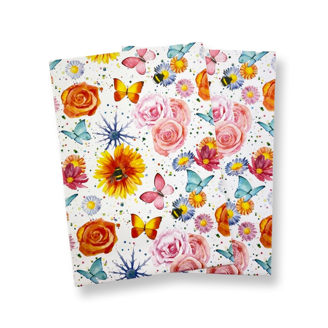 Beautiful floral bee and butterfly gift wrapping perfect form mother's day, birthday and any other occasion.