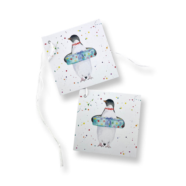 Penguin party recycled and recyclable gift wrap with matching tags by Ceinwen Campbell