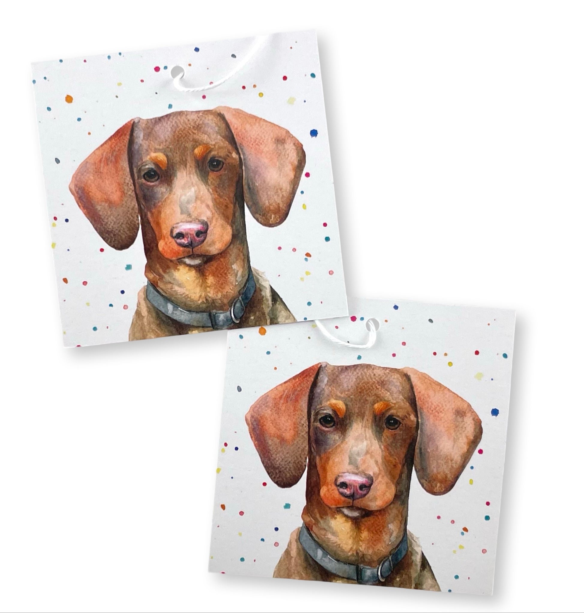 Strung recycled Dachshund gift tags from gift wrapping set by Ceinwen Campbell 