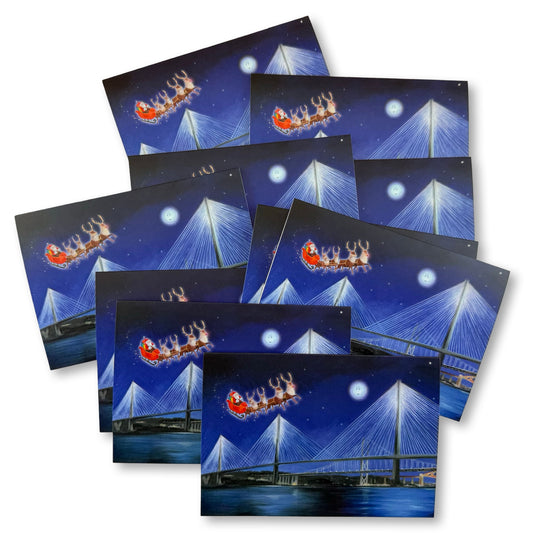 Queensferry crossing  Christmas cards with Santa Claus on a sleigh over the bridge at night.