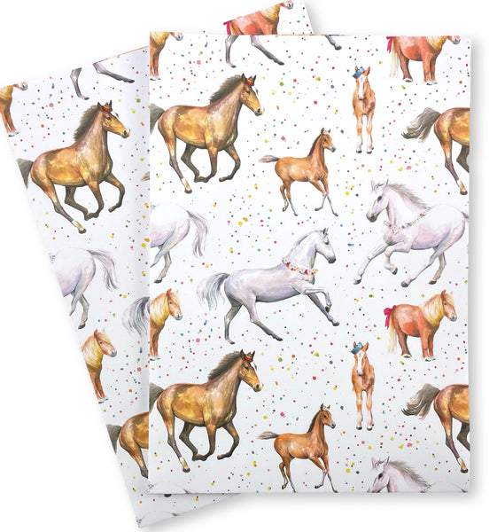 Fun, colourful horse and pony quality recycled and recyclable gift wrapping paper and matching rosette tags. Printed with vegetable based inks in England 