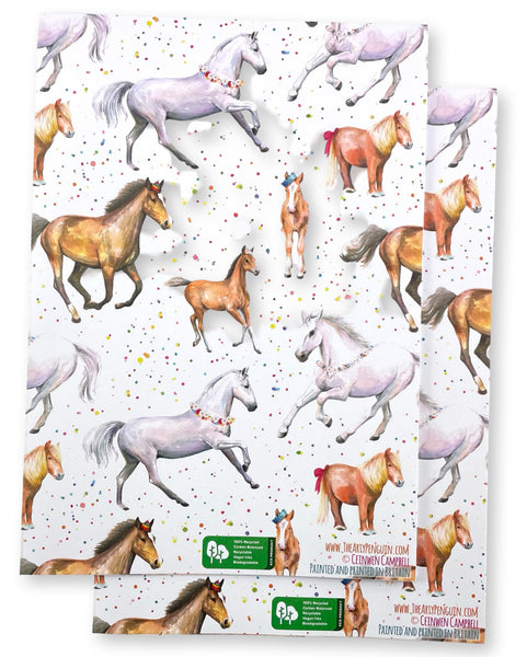 Fun, colourful horse and pony quality recycled and recyclable gift wrapping paper and matching rosette tags. Printed with vegetable based inks in England 