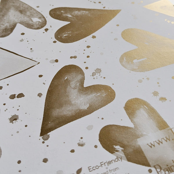 gold heart recyclable gift wrap printed in the UK by Ceinwen Campbell 
